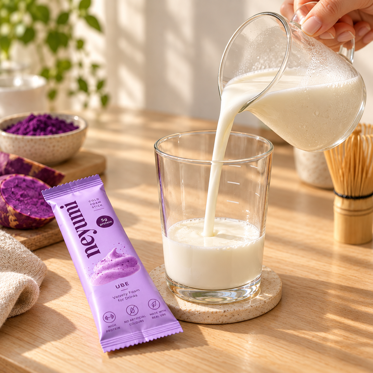 Pouring cold milk into a glass